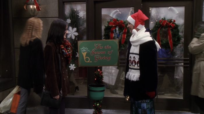 Phoebe Buffay as a Salvation Army bell ringer during Christmas.