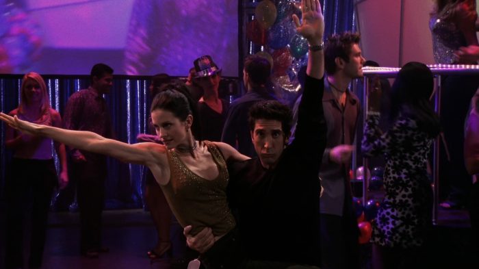 Ross and Monica Geller performing "The Routine" dance for New Year's Rockin' Eve.
