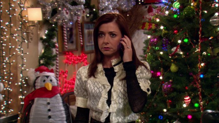 Lily Aldrin removing Christmas decorations from the apartment after Ted’s "grinch" comment.
